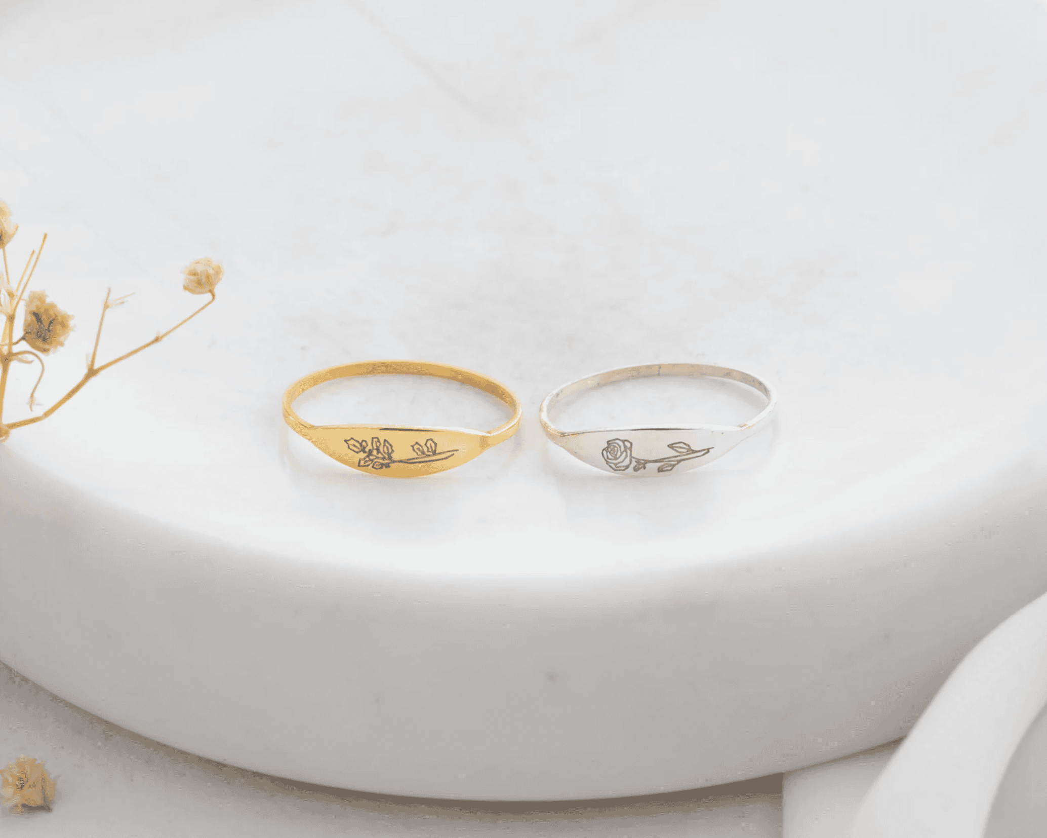 Gold and silver engraved flower wedding band rings, customizable jewelry, delicate floral design, handcrafted jewelry, Nayram - Custom Jewelry, minimalistic wedding bands, engraved rings for couples.