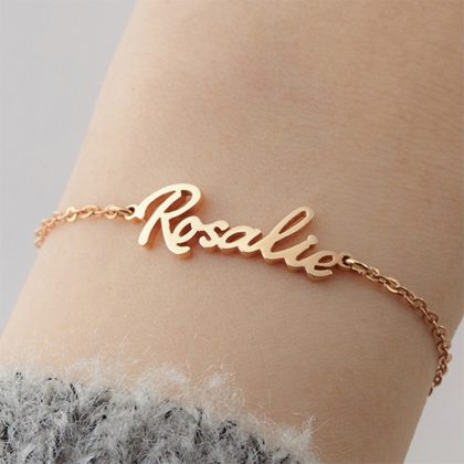 Personalized gold name necklace with "Rosalie" on a delicate chain, perfect for custom jewelry lovers. Handcrafted fine jewelry for special occasions or everyday wear.