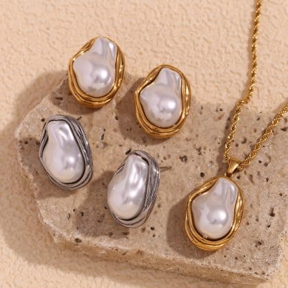 Elegant pearl jewelry set including gold and silver earrings and a necklace, handcrafted by Nayram - Custom Jewelry, featuring baroque freshwater pearls for a luxurious look.