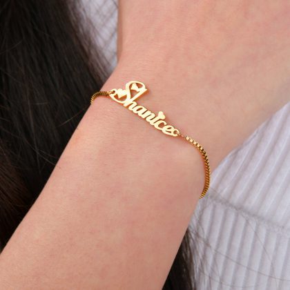Shantie personalized gold bracelet with heart accents, perfect for custom jewelry lovers looking for unique jewelry designs and special gift ideas.