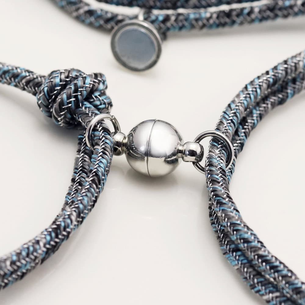 Stainless steel and black and blue woven necklace with a magnetic clasp, custom jewelry piece from Nayram.