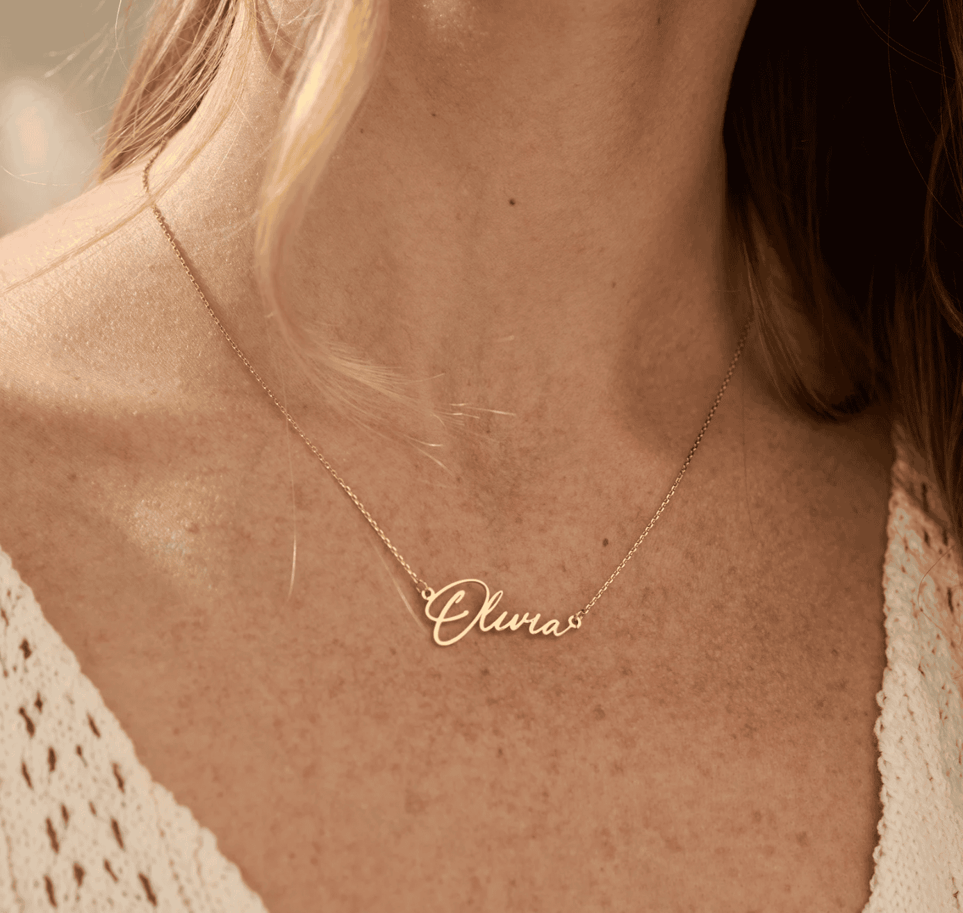 Delicate gold personalized name necklace with the name "Clara", perfect for custom jewelry lovers. Elegant jewelry piece for women, crafted with fine attention to detail.