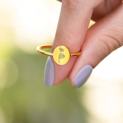 Delicate gold ring with engraved floral design, perfect as custom jewelry for women or special occasions from Nayram. Elegant and stylish handcrafted jewelry piece.